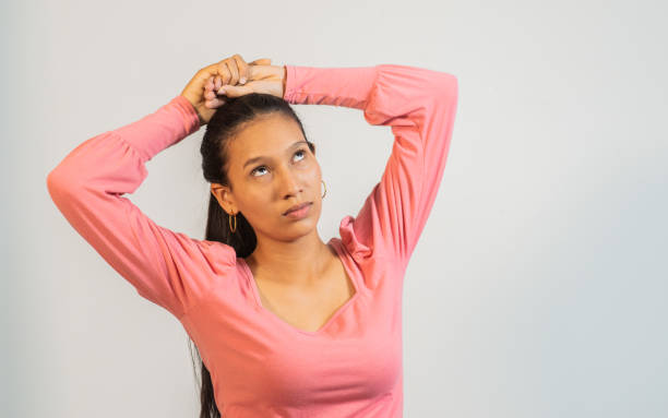 istock latin woman in photo studio 1477656386