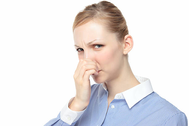 istock Women pinch the nose 147765647