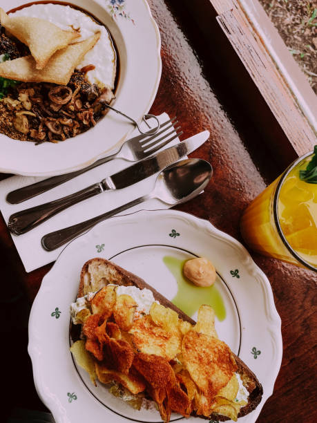 istock Fancy brunch dishes with lemonade and cutlery on the table, top view 1477656520