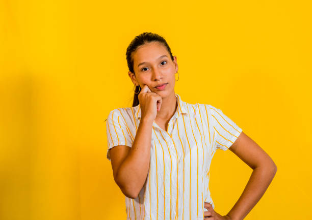 istock latin woman in photo studio 1477657584