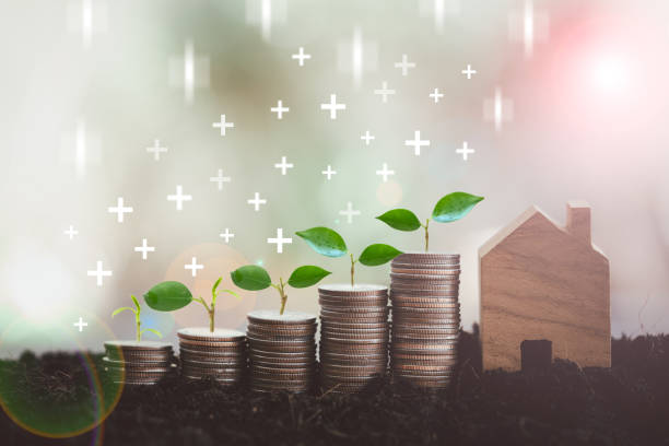 istock Step of coins stacks with tree growing on top and home with keep increasing icon of interest. Home interest increasing 1477657892