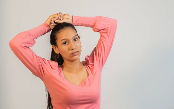 istock latin woman in photo studio 1477658762