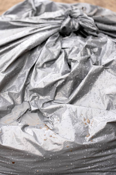 istock trash bag black color garbage waste close up 1477669842