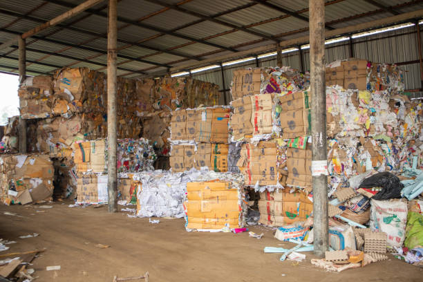 istock Garbage sorting plant and recycled paper box 1477676208