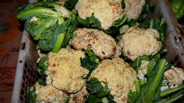 istock Heap of Cauliflower in Vegetable Market 1477680133