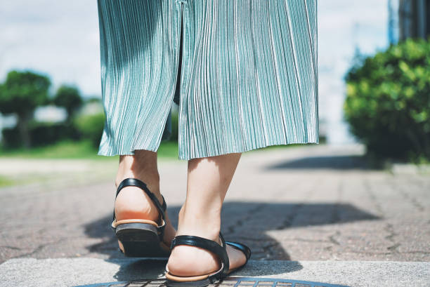 istock feet of a walking woman 1477684878