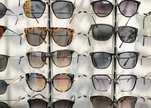 istock Sunglasses on display shelves in glasses store 1477689798