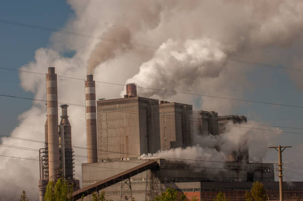 istock Smoke from factory chimneys 1477690167