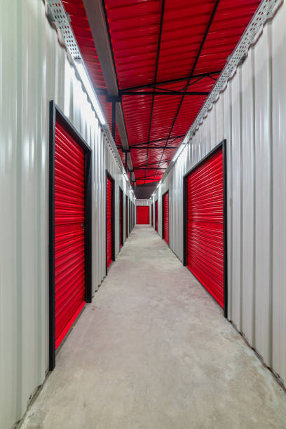 istock Corridor of self storage unit with red doors. Rental Storage Units 1477694992