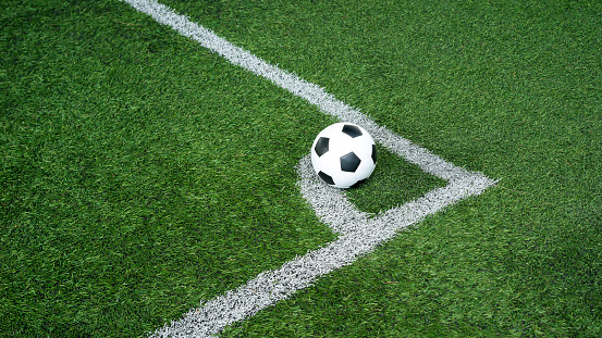 Soccer Football on Corner kick line of ball and a soccer field , football field , background texture