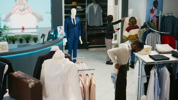 istock Multiethnic group of people looking at trendy clothes 1477702008