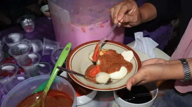 Photo of Siomay,indonesian traditional food, steamed fish dumpling with peanut sauce