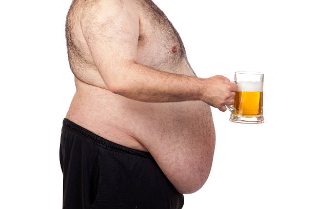 istock Fat man drinking a jar of beer 147770617