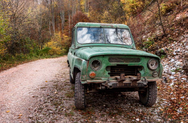 istock Old shabby terrain car in nature 1477712284