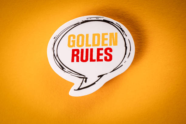 Golden Rules concept. Speech bubble with text on yellow background Golden Rules concept. Speech bubble with text on yellow background. rules quotes stock pictures, royalty-free photos & images