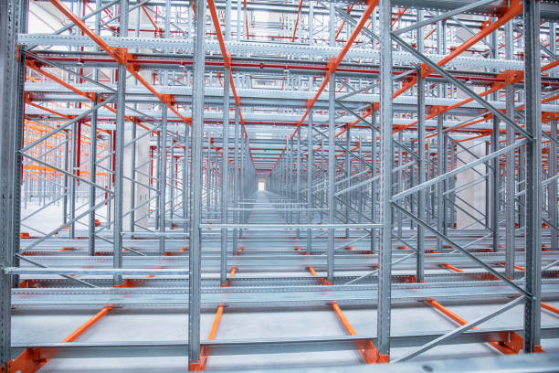 istock Warehouse or storage and shelves. Industrial background. 1477721997