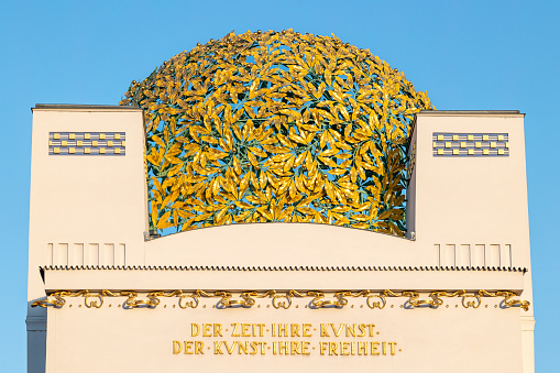 Close-up of gilded roof sphere shining in morning sunlight on roof of Art Nouveau Secession building in Vienna completed in 1898 by Joseph Maria Olbrich with motto \