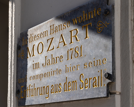 Marble plaque with gilded lettering on house where Wolfgang Amadeus Mozart composed the opera Abduction from the Seraglio in Vienna in 1781