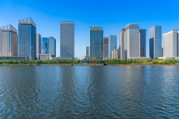 istock Business district office buildings and water reflection in Beijing 1477729867