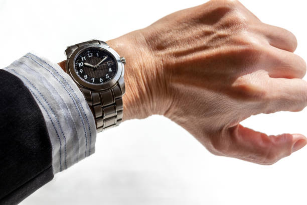 istock Check the time on the wrist watch 1477731115