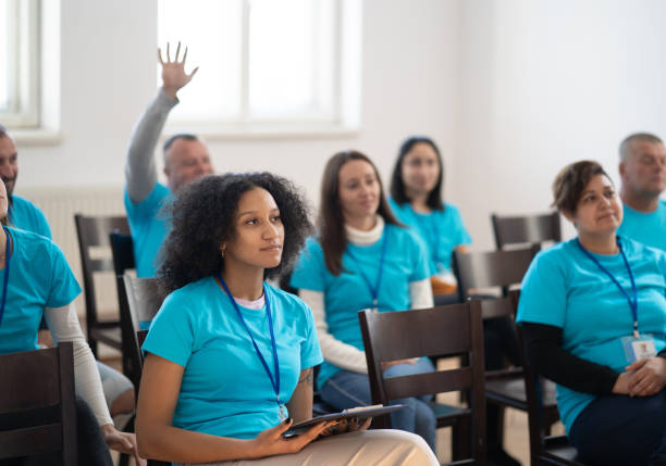 istock Educating charity volunteers 1477731412