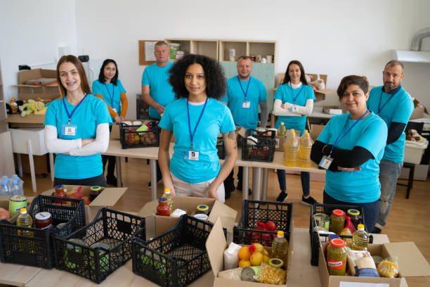 istock Charity volunteers posing for the camera 1477731414