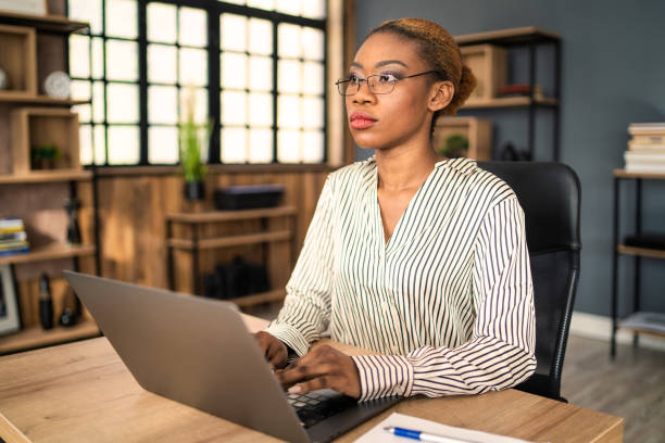 istock A beautiful typist touch typing on a laptop 1477732784