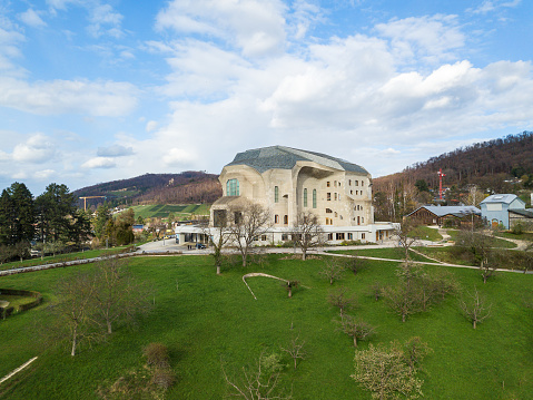 Dornach, Switzerland - March 27. 2023: Modern architecture of the Goetheanum II, desigen in Expressionistic architecture style in 1924, is the world center for anthroposophical movement.