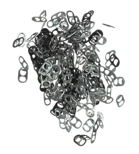istock Can Caps fly in mid air, aluminium canned cap falling scatter, recycle from trash can cap explosion float. White background isolated freeze motion high speed shutter 1477740963
