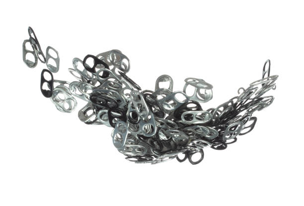 istock Can Caps fly in mid air, aluminium canned cap falling scatter, recycle from trash can cap explosion float. White background isolated freeze motion high speed shutter 1477741543