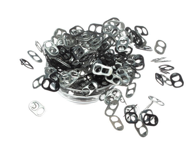 istock Can Caps fly in mid air, aluminium canned cap falling scatter, recycle from trash can cap explosion float. White background isolated freeze motion high speed shutter 1477741650