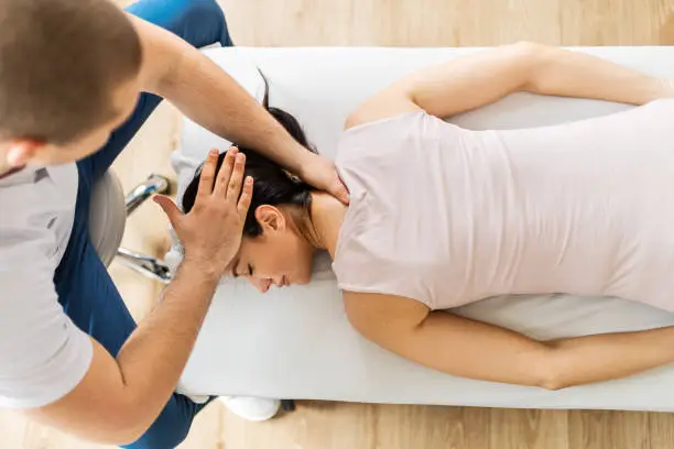 Physical therapy ,female patient with chiropractor