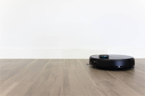 istock Modern Robotic Vacuum Cleaner for Smart Homes 1477754142