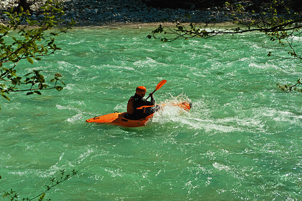 istock Man rowing in kayak at mountain river. 147775568
