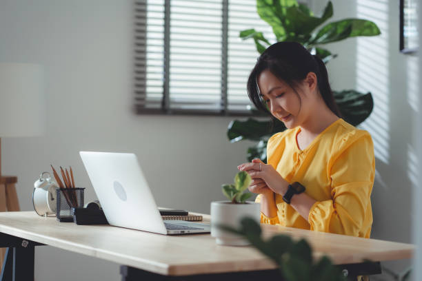 istock Asian woman sitting at home office feel so sad with problem after married. 1477760773