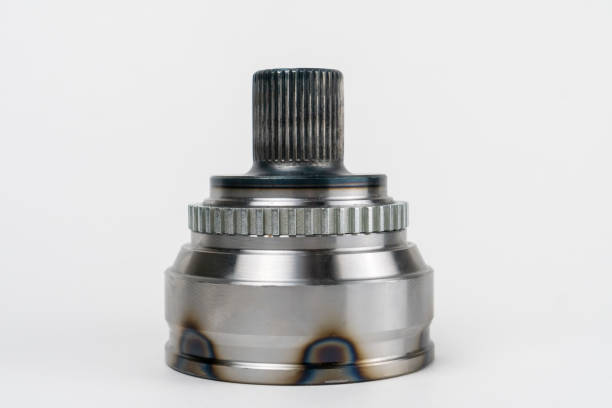 istock Close-up of a constant velocity joint on a white background. Universal spherical joint with constant speed new shiny. Concept of repair, car service, spare parts store 1477761689