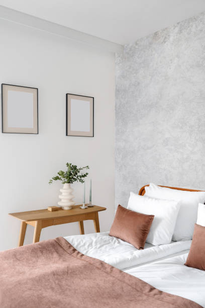 istock modern hotel room with bed, pillows, fresh bedding and decor 1477765485