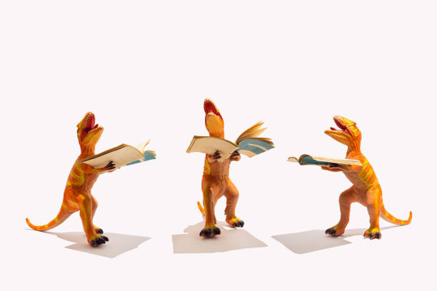 istock Creative and funny pattern of dinosaur who dramas because of studying, reading. Concept of education, studying and teaching. 1477767086