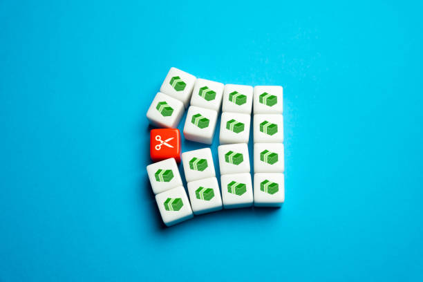 istock Budget cuts, tough economy. Scissors split the budget in half. Cutting spendings. Optimization of costs. Division of property after divorce. Inflation and the global crisis. Capital, savings. 1477767174