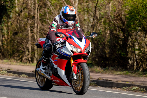 Towcester, Northants., UK - April 10th 2022. Honda CBR Super Sport  motorcycle travelling on an English country road