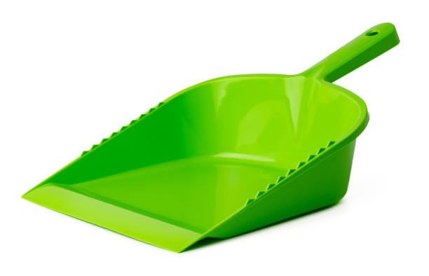 istock Green plastic dustpan isolated on white background 1477770248