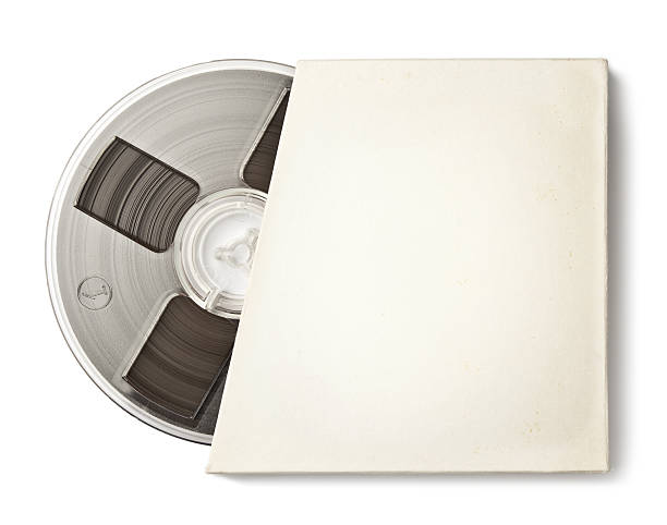 Audio reel Vintage magnetic audio reel in a blank paper package. reel to reel tape stock pictures, royalty-free photos & images