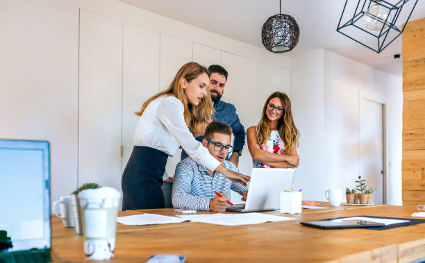 istock Business people checking project on the laptop 1477771292