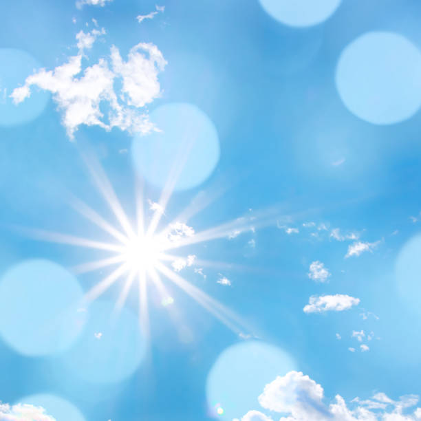 istock Bright sun with beautiful beams and bokeh light in the sky 1477771669