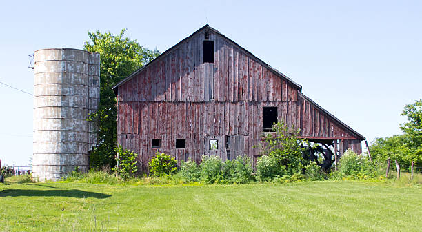 Old Wood barn with silo stock photo