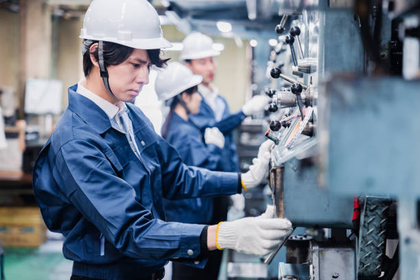 Staff working at a power plant stock photo