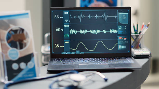 istock Heartbeat on laptop at empty front desk 1477787333