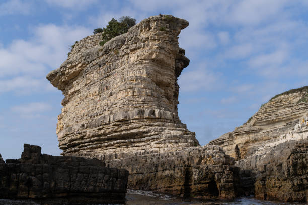 istock Rock formations on a sunny and beautiful cloudy day. 1477792830