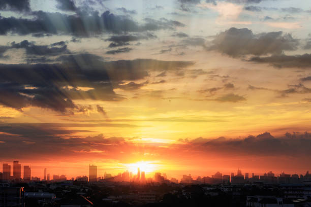 istock Sunset  with cityscape of building silhouette. 1477798045