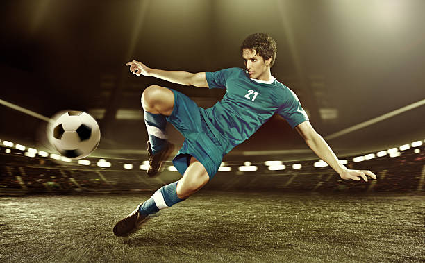 istock football player volleying ball 147779973